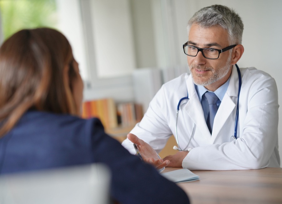 Doctor speaking with a patient during a consultation